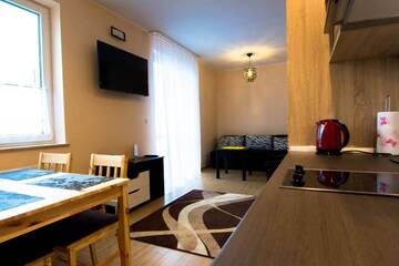 Фото номера One-Bedroom Apartment (Pielgrzyma) Апартаменты Apartamenty Izerskie г. Сверадув-Здруй 6