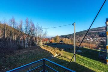 Фото номера Two-Bedroom Apartment (Kominkowy z Sauna) Апартаменты Apartamenty Izerskie г. Сверадув-Здруй 2