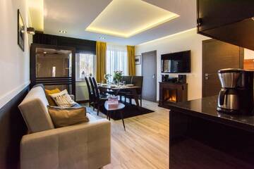 Фото номера Two-Bedroom Apartment (Kominkowy z Sauna) Апартаменты Apartamenty Izerskie г. Сверадув-Здруй 11