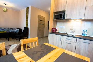 Фото номера One-Bedroom Apartment (Pielgrzyma) Апартаменты Apartamenty Izerskie г. Сверадув-Здруй 5