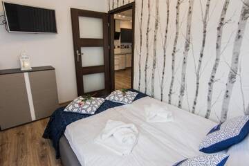 Фото номера Two-Bedroom Apartment (Leśny Zakątek) Апарт-отели Apartamenty Izerskie - ul. Cicha 13H-I г. Сверадув-Здруй 5